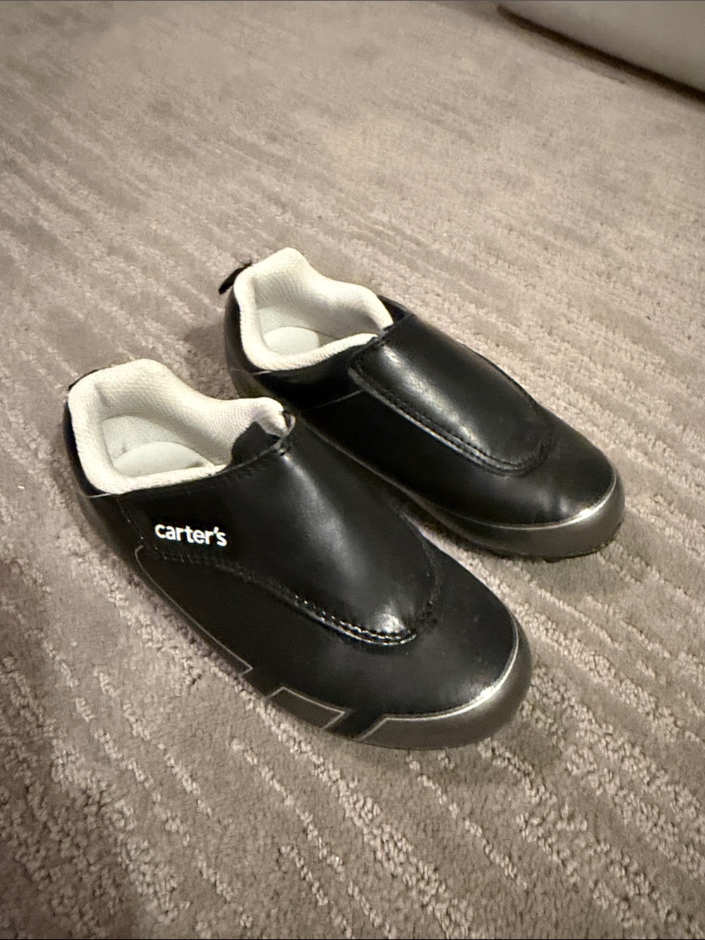 Carter's Black Slip-On Kids Soccer cleats with White Lining